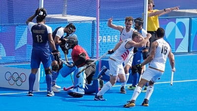 John-John Dohmen scored the second goal for Belgium in the third quarter to put them ahead in the game for the first time. (AP) John-John Dohmen scored the second goal for Belgium in the third quarter to put them ahead in the game for the first time. (AP)