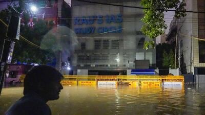 Amid furore over waterlogging-related deaths at Rau’s IAS Study Circle, the road outside the coaching centre was severely waterlogged again during an extreme rainfall in the intervening night of July 31 and August 1. (PTI)