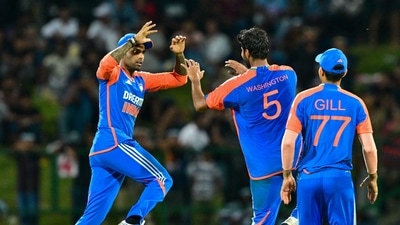 India's Washington Sundar (C) celebrates with captain Suryakumar Yadav (L) (AFP)