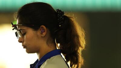 India's Manu Bhaker concentrates before shooting during 25m pistol women pre-event training in Chateauroux on Thursday. (AP) India's Manu Bhaker concentrates before shooting during 25m pistol women pre-event training in Chateauroux on Thursday. (AP)