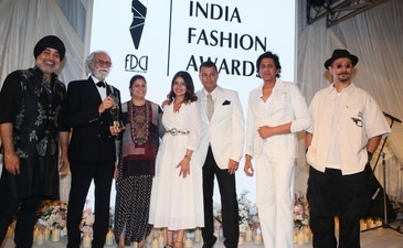(L-R) Group vice president of Reliance Brands Ltd Jaspreet Chandok, FDCI chairperson Sunil Sethi; Head of Fashion at FDCI, Neha Kohli; Board of Directors of  FDCI — Shruti Sancheti, Ashish Soni, Pawan Sachdeva and Nitin Bal Chauhan (Manoj Verma/HT Photo)