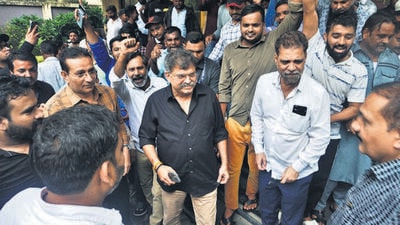 NCP (SP) MLA Jitendra Awhad was travelling from Mumbai to Thane when his car was attacked and vandalised by Swaraj Sanghatana activists in Mumbai. Awhad interacted with the media at his home in Thane later, with police personnel in tow. (Praful Gangurde /HT Photo) NCP (SP) MLA Jitendra Awhad was travelling from Mumbai to Thane when his car was attacked and vandalised by Swaraj Sanghatana activists in Mumbai. Awhad interacted with the media at his home in Thane later, with police personnel in tow. (Praful Gangurde /HT Photo)
