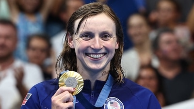 Gold medallist Katie Ledecky of United States celebrates after winning. (REUTERS)