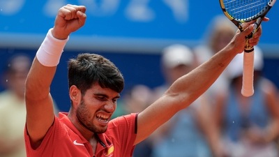 Carlos Alcaraz of Spain celebrates his victory over Tommy Paul (AP)