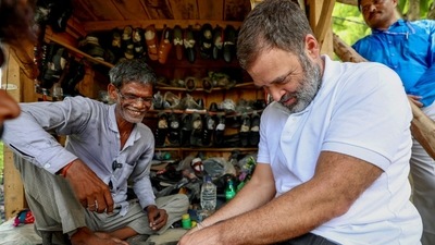 Rahul Gandhi tries his hands at shoe repairing during a short conversation with Ram Chait, a cobbler in Kurebhar near Sultanpur. He met Chait while on his way back to Lucknow from Sultanpur on Friday (ANI) Rahul Gandhi tries his hands at shoe repairing during a short conversation with Ram Chait, a cobbler in Kurebhar near Sultanpur. He met Chait while on his way back to Lucknow from Sultanpur on Friday (ANI)