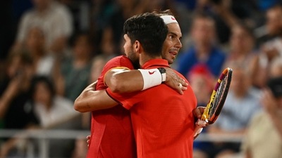 Spain's Rafael Nadal (R) and Spain's Carlos Alcaraz (L) embrace after losing their men's doubles quarter-final tennis match on Court Philippe-Chatrier at the Roland-Garros Stadium during the Paris 2024 Olympics (AFP) Spain's Rafael Nadal (R) and Spain's Carlos Alcaraz (L) embrace after losing their men's doubles quarter-final tennis match on Court Philippe-Chatrier at the Roland-Garros Stadium during the Paris 2024 Olympics (AFP)