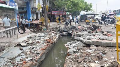The bodies of the mother and son were recovered around 11.30pm from the drain. (Sakib Ali/HT Photo) The bodies of the mother and son were recovered around 11.30pm from the drain. (Sakib Ali/HT Photo)