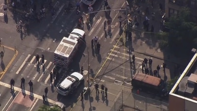 Two NYPD officers were shot during a foot chase in Lower East Side, Manhattan, on Thursday afternoon. One suspect taken into custody. (X / Steven Bognar)