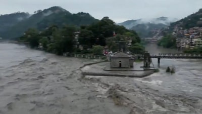 A view shows the overflowing river Beas following heavy rains in Kullu district in the northern state of Himachal Pradesh, India. (ANI) A view shows the overflowing river Beas following heavy rains in Kullu district in the northern state of Himachal Pradesh, India. (ANI)