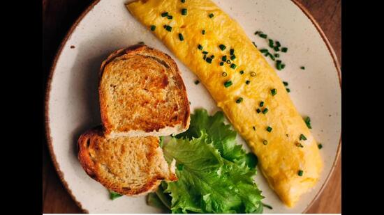 A classic French omelette has two folds and is a test of how good a chef is with his or her hands. (ADOBE STOCK)