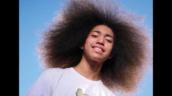 14-year-old Amir Manuel Mendez set the Guinness World Record in 2023 for the largest afro on a male.