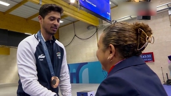 India's shooter Swapnil Kusale receives his bronze medal after the 50m rifle 3 positions men’s final in the Olympic Games Paris 2024(ANI)