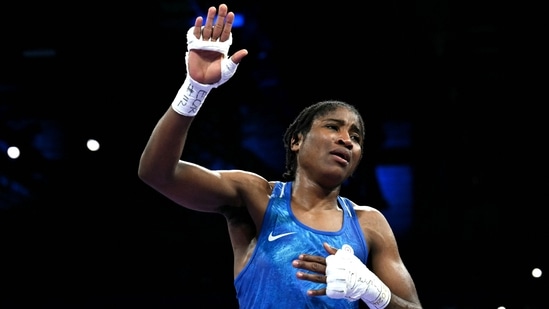 Refugee Olympic Team's Cindy Winner Djankeu Ngamba celebrates after winning against Canada's Tammara Amanda Thibeault (AFP)