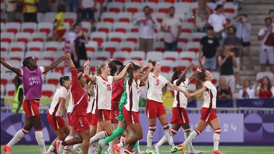 Canada players celebrate after beating Colombia in their Paris Olympics encounter. (REUTERS)