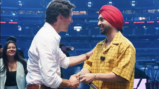 Canadian Prime Minister Justin Trudeau (left) with Indian singer and actor Diljit Dosanjh before the latter’s show in Toronto last month. (Credit: Justin Trudeau/X)