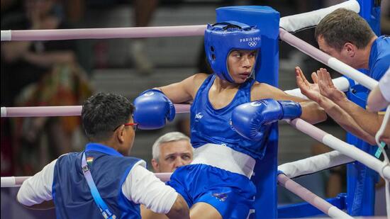 India's Nikhat Zareen during her women’s 50kg Round of 16 bout against China's Wu Yu on Thursday. (PTI)