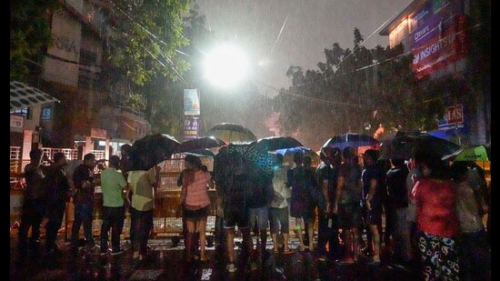 New Delhi: Students protest at a barricaded road near Rau's IAS Study Circle at Old Rajinder Nagar during rain, in New Delhi, Wednesday, July 31, 2024. (PTI Photo/Shahbaz Khan) (PTI08_01_2024_000019B) (PTI)