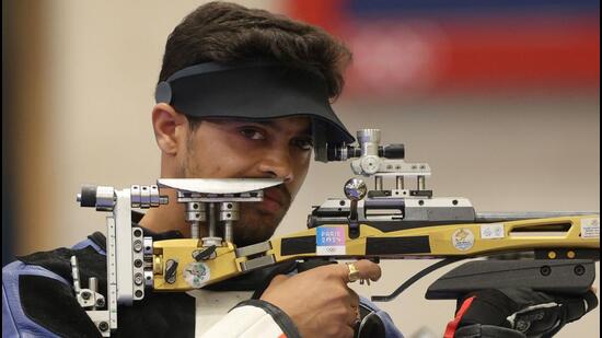 Swapnil Kusale competes in the 50 Rifle 3 Positions men's final at the Paris Olympics at Chateauroux Shooting Centre on Thursday. (AFP)