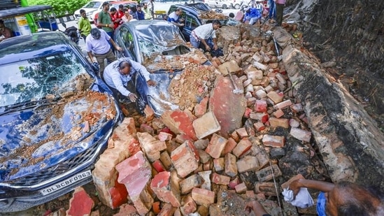 The wall of Happy School in Daryaganj collapsed amid heavy rainfall on Wednesday night. There were no casualties. (RAJ K RAJ /HT PHOTO)