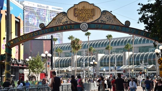 Attendees walk outside the San Diego Convention Center on the first day of Comic Con International in San Diego, California, on July 24, 2024. (Photo by Chris DELMAS / AFP) 