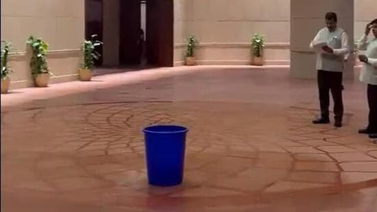 Water dripping from the ceiling of the new Parliament building being collected in a bucket. (Photo from X)