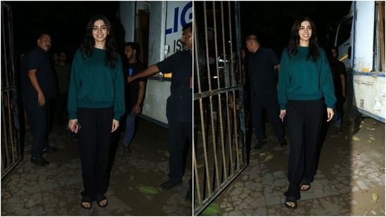 Khushi Kapoor showed how less is more as she stepped out in the city wearing a casual-chic ensemble. She wore a green jumper and black trousers styled with loose tresses and no makeup. (HT Photo/Varinder Chawla)