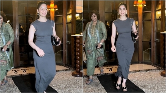 Sara Tendulkar enjoyed a dinner date in the city wearing a grey sleeveless midi dress. The ensemble's round neckline and bodycon silhouette added the oomph factor to Sara's look. She accessorised it with a shoulder bag, slip-on sandals, a ponytail, earrings, and minimal glam. (HT Photo/Varinder Chawla)
