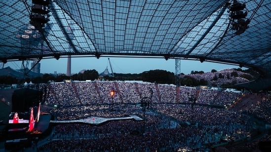 On Saturday, they braved the heat, which reached 31 Celsius (88 Fahrenheit) and claimed their spots hours before the concert began.