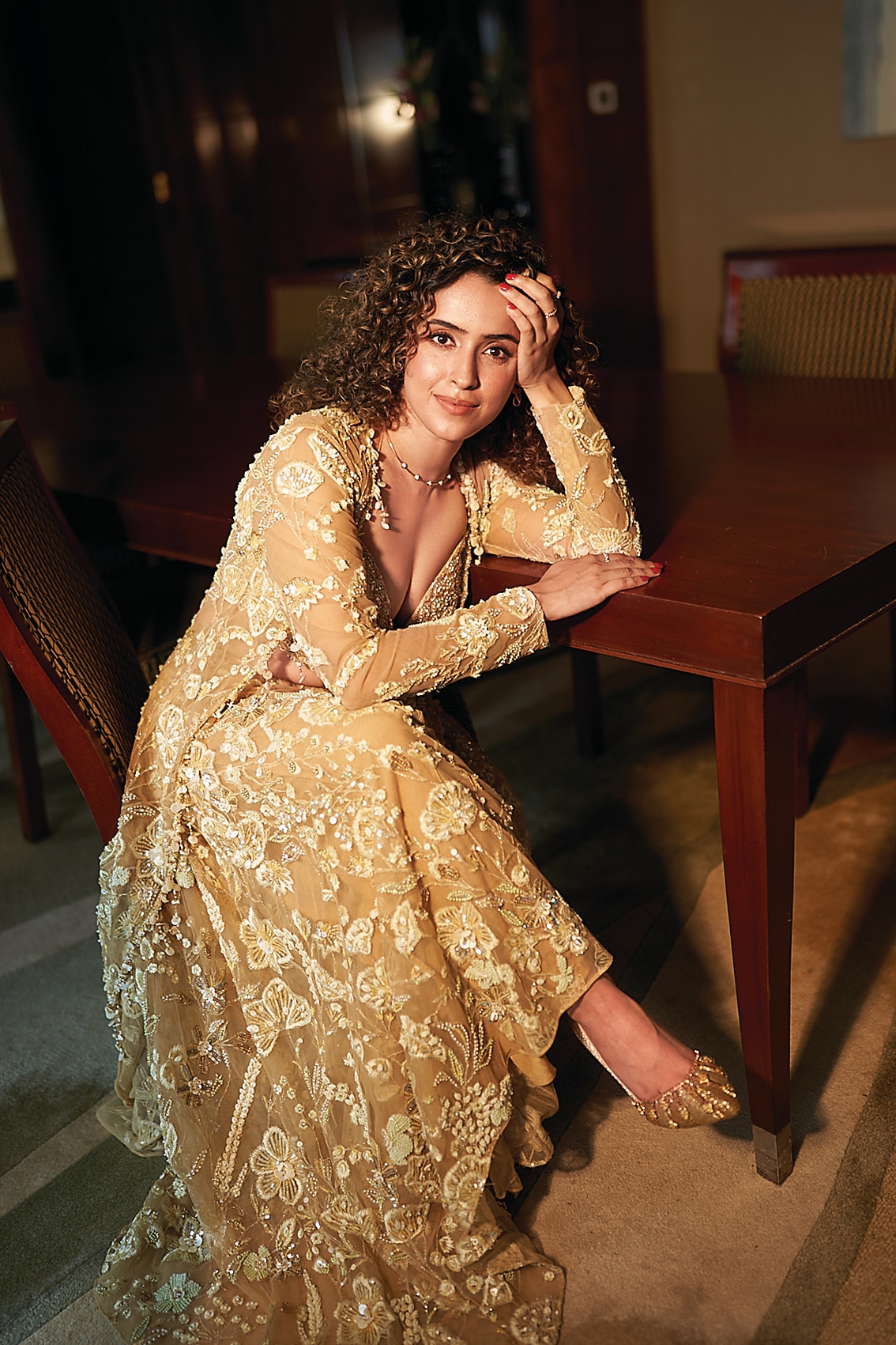Actor Sanya Malhotra shines in a co-ord set from Moledro that features a hand-embroidered cowl-neck blouse. Paired with fluid pants adorned with floral motifs, the ensemble is sure to make a statement at after-parties. The look has been accessorised with a diamond necklace set in gold from CaratLane for timeless allure (Vidhi Godha) Actor Sanya Malhotra shines in a co-ord set from Moledro that features a hand-embroidered cowl-neck blouse. Paired with fluid pants adorned with floral motifs, the ensemble is sure to make a statement at after-parties. The look has been accessorised with a diamond necklace set in gold from CaratLane for timeless allure (Vidhi Godha)