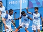 Indian players celebrate after the side clinched a historic first win over Australia in men's hockey at the Olympics in 52 years.(AP)