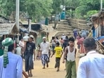 This photo taken on May 24, 2024 shows Rohingya refugees walking down a path at a Rohingya refugee camp in Ukhia in Bangladesh's southeastern Cox's Bazar district. (AFP) This photo taken on May 24, 2024 shows Rohingya refugees walking down a path at a Rohingya refugee camp in Ukhia in Bangladesh's southeastern Cox's Bazar district. (AFP)