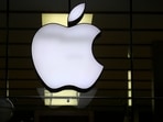 The Apple logo is illuminated at a store in the city center in Munich, Germany.(AP) The Apple logo is illuminated at a store in the city center in Munich, Germany.(AP)