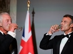 Britain's King Charles and French President Emmanuel Macron drink after a toast during a state banquet at the Palace of Versailles, west of Paris, on September 20, 2023, on the first day of a British royal state visit to France. DANIEL LEAL/Pool via REUTERS/File Photo