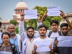NEET aspirants assembles on the Supreme court of India premises during a hearing on NEET paper leak case in New Delhi. (Sanchit Khanna/HT) NEET aspirants assembles on the Supreme court of India premises during a hearing on NEET paper leak case in New Delhi. (Sanchit Khanna/HT)