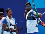 Ankita Bhakat and Dhiraj Bommadevara of India compete in the archery mixed team event at the Paris Olympics