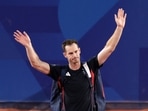 Andy Murray of Britain waves to spectators.