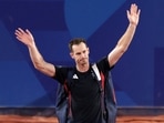 Andy Murray of Britain waves to spectators.