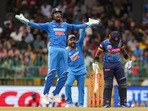 Rohit Sharma and KL Rahul go up in an appeal