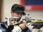 India's Swapnil Kusale competes in the 50 Rifle 3 Positions men's final. India's Swapnil Kusale competes in the 50 Rifle 3 Positions men's final.