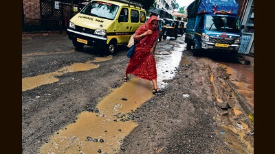 A photo of a pothole was also received by him, and the complaint was assigned to junior engineer Nilam Gaikwad. (MAHENDRA KOLHE/ HT PHOTO) A photo of a pothole was also received by him, and the complaint was assigned to junior engineer Nilam Gaikwad. (MAHENDRA KOLHE/ HT PHOTO)