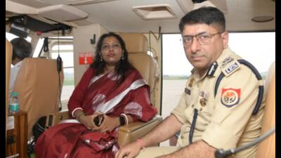Divisional commissioner Selva Kumari J and IG, Meerut range, Nachiketa Jha during the aerial survey. (Sourced)