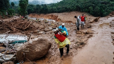 Heavy rainfall, upto 572 mm in 24 hours, in the Wayanad district of Kerala triggered a series of landslides thaat have led to over 300 people dead and homes swept away (AP Photo/Rafiq Maqbool) (AP) Heavy rainfall, upto 572 mm in 24 hours, in the Wayanad district of Kerala triggered a series of landslides thaat have led to over 300 people dead and homes swept away (AP Photo/Rafiq Maqbool) (AP)
