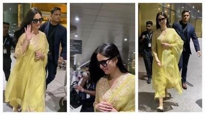 Katrina Kaif was spotted at the airport sporting a traditional look. In a yellow organza suit with floral designs near the v-neckline, she looked gorgeous. With no make-up, she wore matching yellow juttis and cool shades. (Instagram/@varindertchawla) Katrina Kaif was spotted at the airport sporting a traditional look. In a yellow organza suit with floral designs near the v-neckline, she looked gorgeous. With no make-up, she wore matching yellow juttis and cool shades. (Instagram/@varindertchawla)