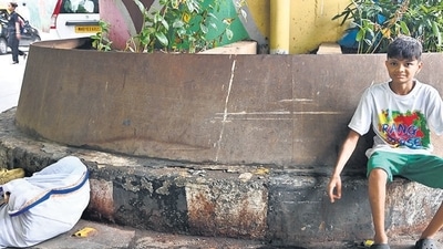Mumbai, India - Aug 01, 2024: 14-year-old Sahil Kharwa is pointing out the spot of the accident where his mother lost her life after being hit by a speeding car in the Parel area in Mumbai, India.01, 2024. (Photo by Raju Shinde/ Hindustan Times) (Hindustan Times)
