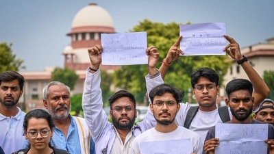 NEET aspirants assembles on the Supreme court of India premises during a hearing on NEET paper leak case in New Delhi. (Sanchit Khanna/HT) NEET aspirants assembles on the Supreme court of India premises during a hearing on NEET paper leak case in New Delhi. (Sanchit Khanna/HT)