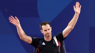 Andy Murray of Britain waves to spectators. (REUTERS)