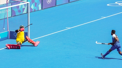India's captain Harmanpreet Singh doubled the Indian lead in the final quarter again, scoring through a penalty stroke to give India 3-1 lead. (PTI) India's captain Harmanpreet Singh doubled the Indian lead in the final quarter again, scoring through a penalty stroke to give India 3-1 lead. (PTI)