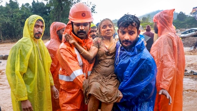 Rescue operation underway after a landslide triggered by heavy monsoon rains, in Wayanad district. (PTI)