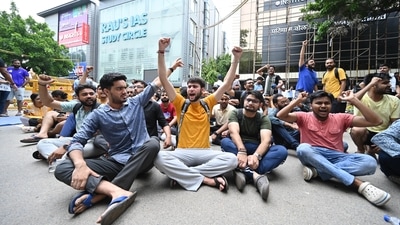 Students protest after three UPSC aspirants were drowned to death after Rau's IAS coaching centres basement library got flooded with rain water following heavy rains on Saturday at Rajendra Nagar in New Delhi. (Photo by Sanchit Khanna/ Hindustan Times) Students protest after three UPSC aspirants were drowned to death after Rau's IAS coaching centres basement library got flooded with rain water following heavy rains on Saturday at Rajendra Nagar in New Delhi. (Photo by Sanchit Khanna/ Hindustan Times)