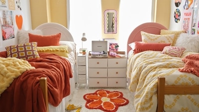 For those looking to decorate their dorm room, '70s retro style is a popular one this year. Look for stick-on wall art and easy-to-clean pillows, throw blankets and small rugs. (AP) For those looking to decorate their dorm room, '70s retro style is a popular one this year. Look for stick-on wall art and easy-to-clean pillows, throw blankets and small rugs. (AP)